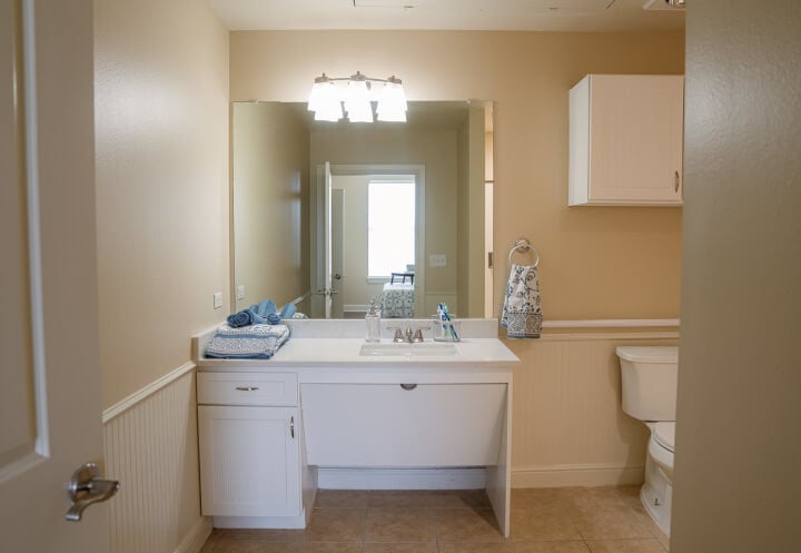 Accessible Bathroom with Vanity and Mirror at Assisted Living Facility Accessible Bathroom with Vanity and Mirror at Assisted Living Facility