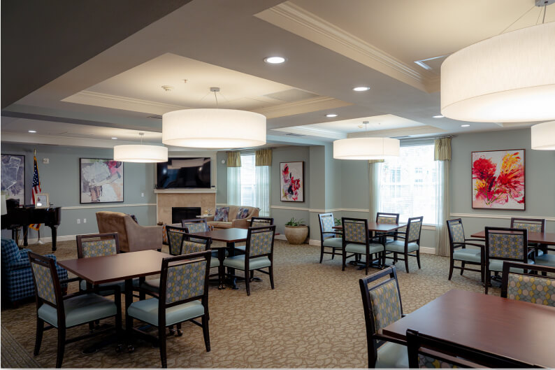 Elegant Dining Room with Fireplace at Memory Care Facility Elegant Dining Room with Fireplace at Memory Care Facility