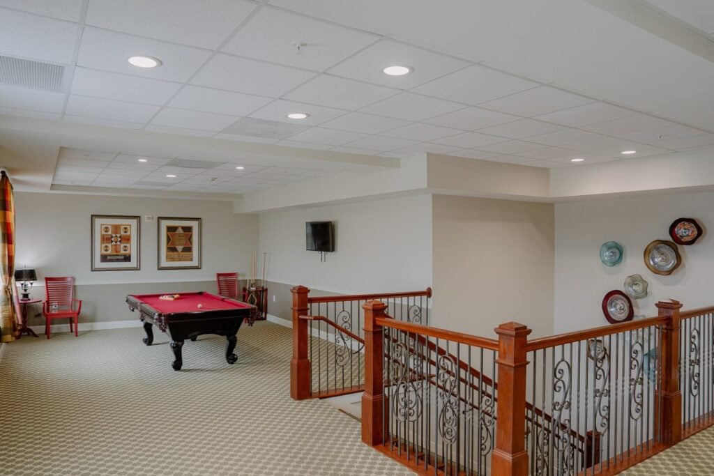 Recreation Loft with Billiards Table at Memory Care Facility