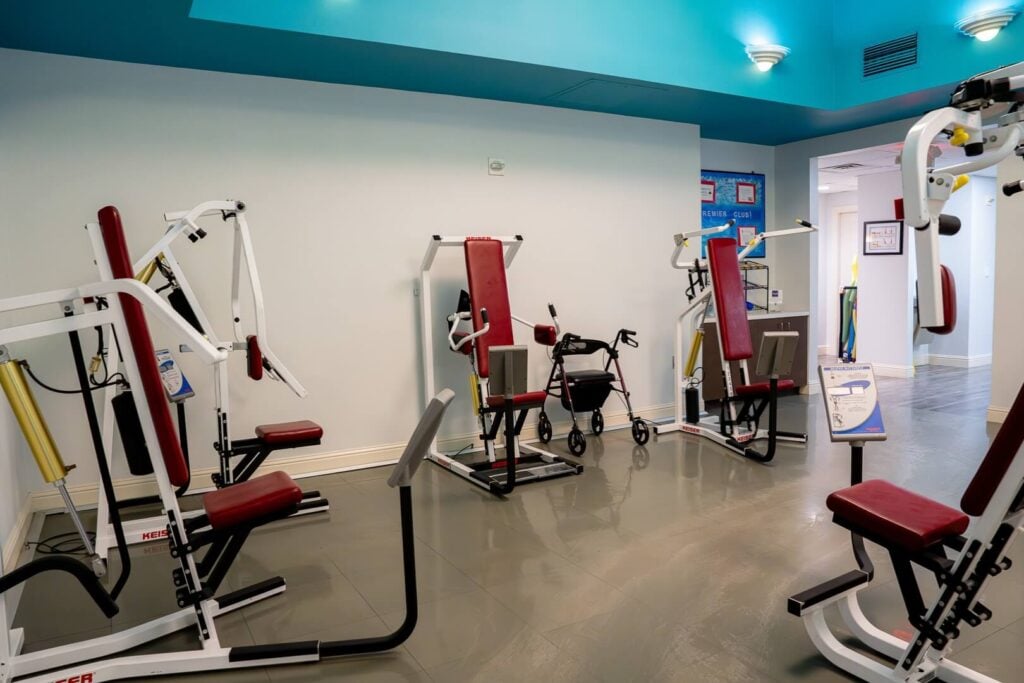 Fitness Center with Strength Training Machines at Assisted Living Facility