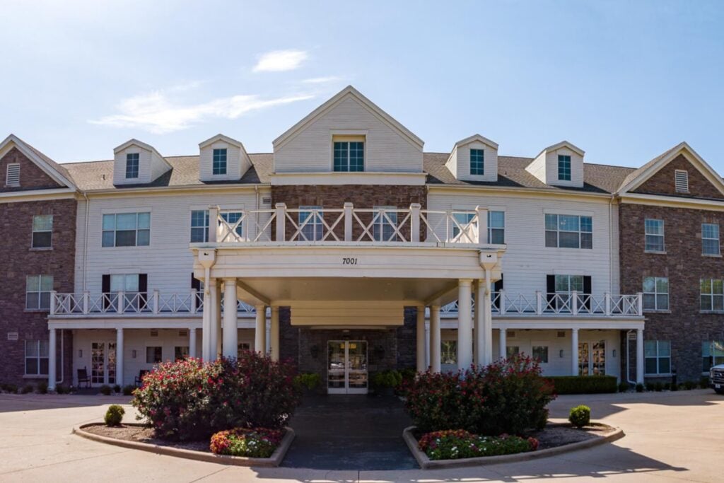 Grand Front Entrance with Columned Portico at Assisted Living Facility