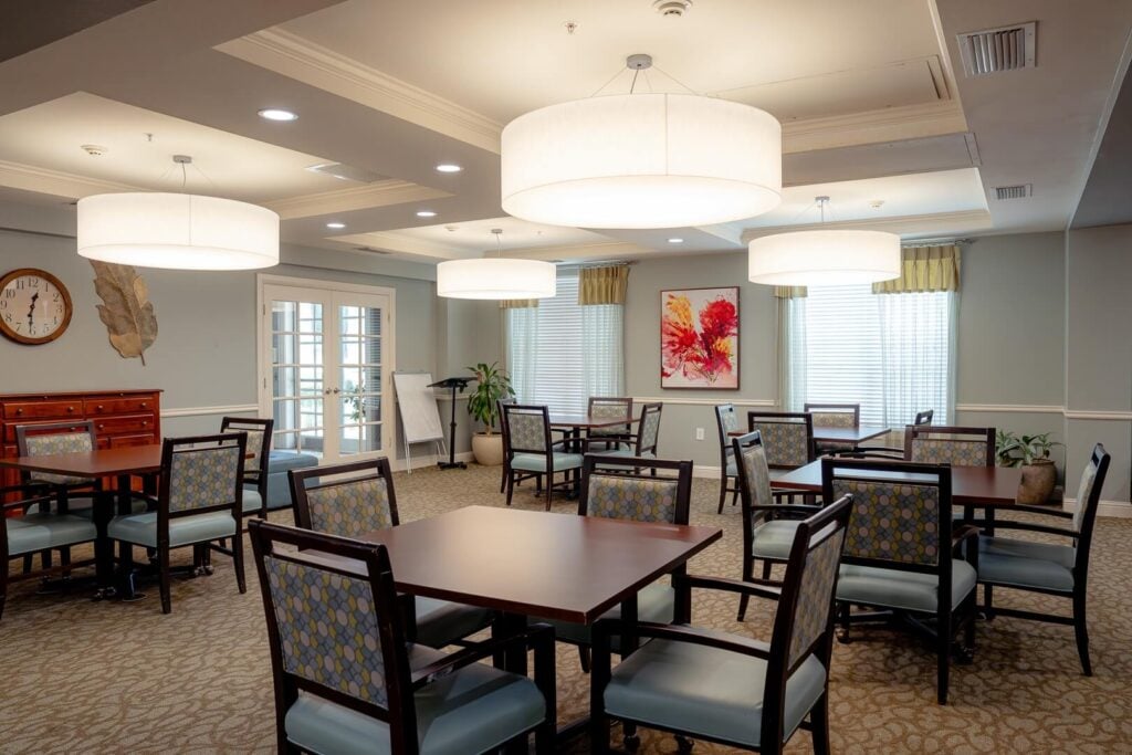 Open Dining Area with Pendant Lighting at Memory Care Facility