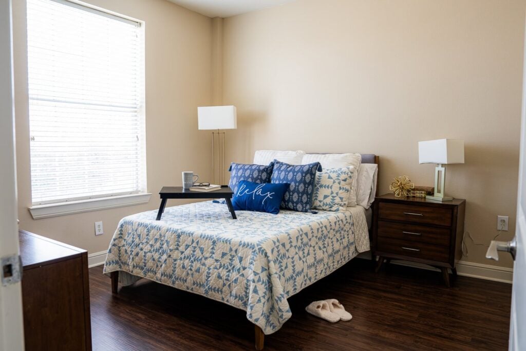 Inviting Resident Bedroom with Soft Lighting at Memory Care Facility