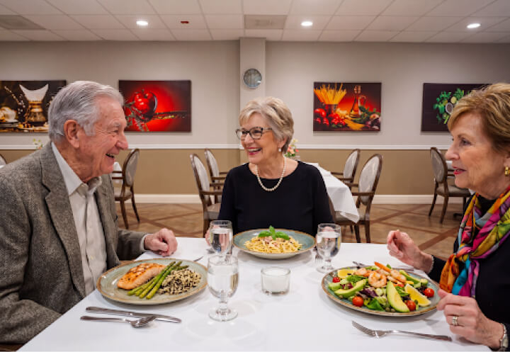 Elderly Residents Enjoying a Meal at Memory Care Community Elderly Residents Enjoying a Meal at Memory Care Community